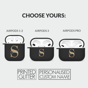 May include: Three black Airpod cases with a gold glitter initial "S" and the name "Sarah" in gold script. The cases are for Airpods 1-2, Airpods 3, and Airpods Pro. The text "PRINTED GLITTER" and "PERSONALISED CUSTOM NAME" is below the cases.