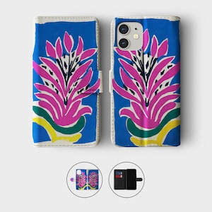 May include: Blue and white phone case with a vibrant floral design. The case features a bright blue background with a large pink and black floral pattern. The design includes green and yellow accents. The case is shown open and closed.