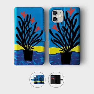 May include: Blue phone case with a vibrant abstract design. The case features a black plant with red flowers against a blue sky and yellow horizon. The design is repeated on the front and back of the case, with a small image of the design at the bottom.