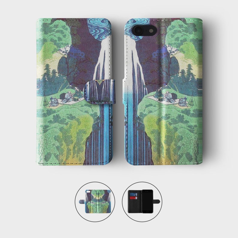 May include: A phone case with a colorful Japanese-inspired design featuring a waterfall and trees. The case is made of leather and has a flap that closes with a snap.