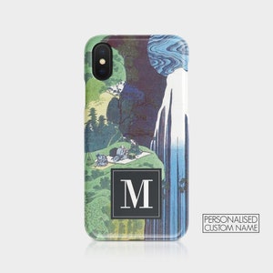 May include: A phone case with a blue and green Japanese-inspired design. The case features a waterfall and a mountain scene with a black square with a white letter "M" in the center.