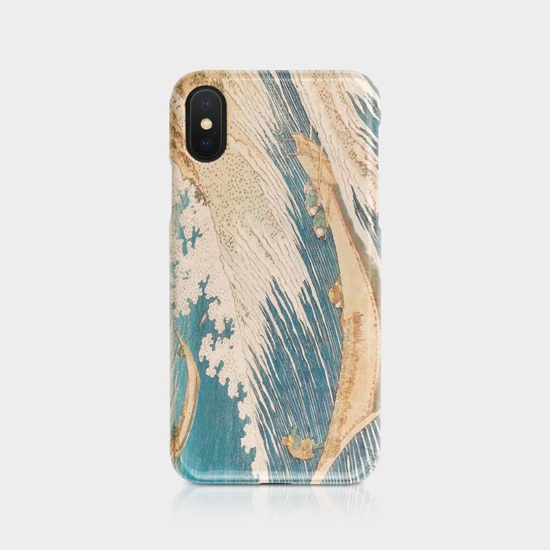 May include: A smartphone case featuring a Japanese-style wave design in shades of blue, beige, and white. The case has a glossy finish and a camera cutout at the top. The design is reminiscent of traditional woodblock prints.
