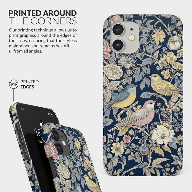 May include: A phone case with a floral pattern featuring birds and flowers on a dark blue background. The case is printed around the edges, ensuring the design is visible from all angles. The text "PRINTED EDGES" is visible on the case.
