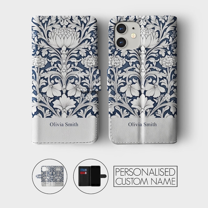 May include: A white and blue floral phone case with a personalized name, "Olivia Smith", printed on the back. The case is made of leather and has a wallet-style design with a slot for cards.