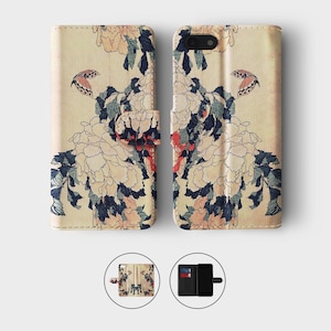 May include: A floral phone case with a butterfly design. The case is made of leather and has a cream background with a vintage-inspired floral pattern in shades of pink, red, blue, and green. The case has a flap that covers the phone screen and a slot for credit cards.