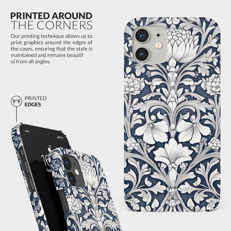 May include: A phone case with a white floral pattern on a dark blue background. The pattern is printed around the edges of the case. The case is designed for an iPhone.