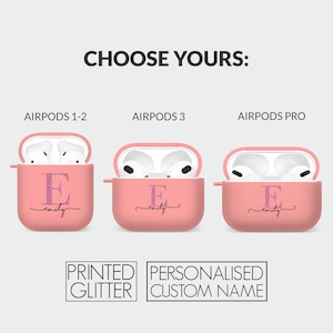 May include: Three pink Airpods cases with a glittery pink letter E and the name "emily" written in cursive. The cases are for Airpods 1-2, Airpods 3, and Airpods Pro. The text "PRINTED GLITTER" and "PERSONALISED CUSTOM NAME" is below the cases.