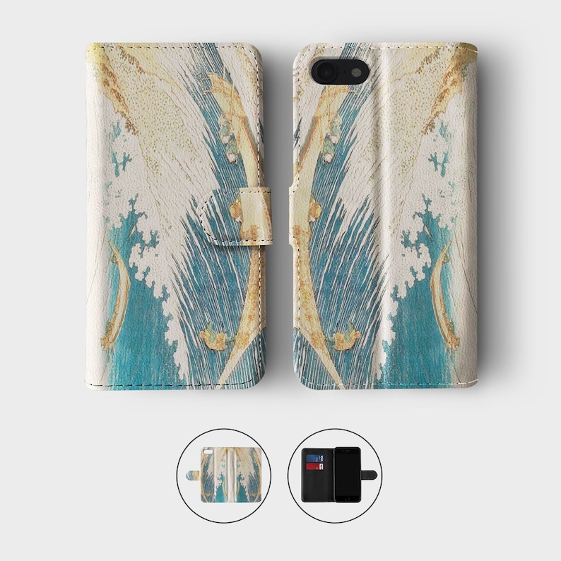 May include: A white leather phone case with a blue and gold wave pattern. The case is open to show the inside, which has slots for cards and a pocket for cash.