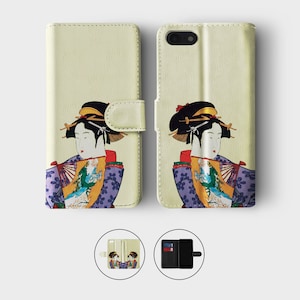 May include: A cream-colored leather phone case with a colorful illustration of a woman in traditional Japanese clothing. The woman is holding a fan and is wearing a purple and yellow kimono with floral patterns. The case has a flap that folds over the phone.