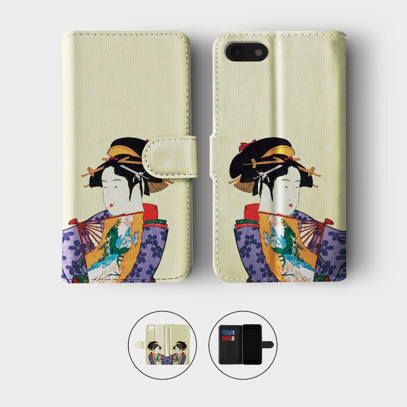 May include: A cream-colored leather phone case with a colorful illustration of a woman in traditional Japanese clothing. The woman is holding a fan and is wearing a purple and yellow kimono with floral patterns. The case has a flap that folds over the phone.