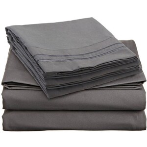 May include: A stack of gray bed sheets with a subtle stripe detail. The sheets are folded neatly and appear soft and comfortable.