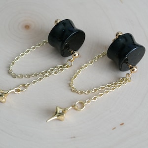 Black Double Flared Plugs Gold Polaris Dangle Gauge Earrings