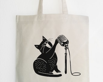 Cat singing with microphone, cat singer jute bag, cotton jute bag, black cat tote bag, cat and microphone bag, Linocut Print Art