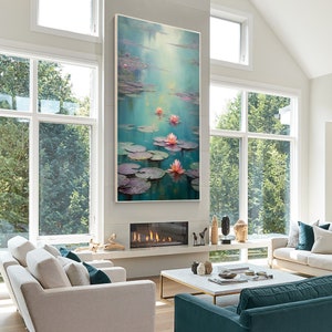 May include: A painting depicting pink water lilies on a pond with green lily pads. The water is a light blue and the background is a soft, hazy blue.