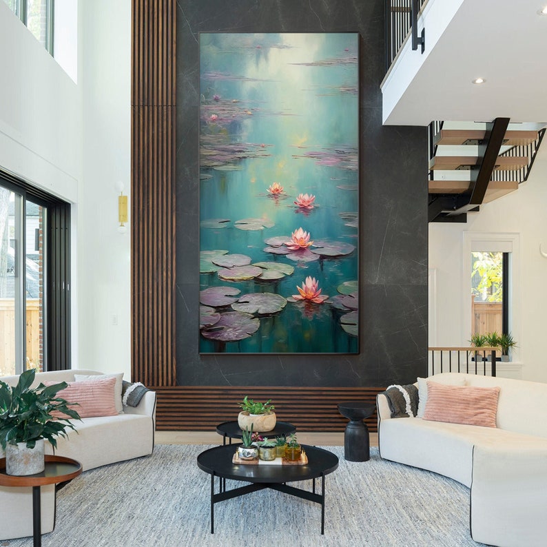May include: A painting of pink water lilies on a pond with green lily pads. The water is a light blue and the background is a soft, hazy blue.
