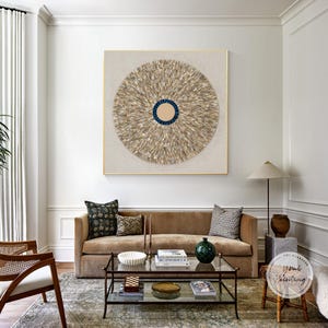 Handcrafted sea shell art with an elegant arrangement of shells, perfect for ocean-inspired decor