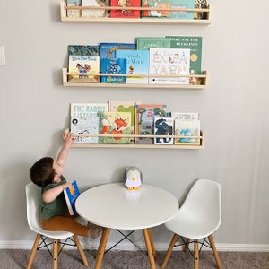 Chic nursery bookshelf for stylish organization. Ideal for Montessori-inspired decor, this gender-neutral piece complements nursery art and wallpapers. Elevate your nursery room with functional and charming nursery furniture