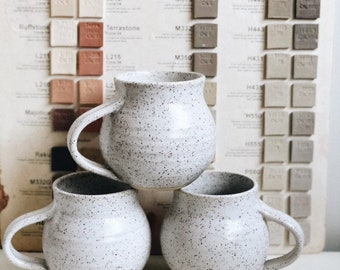 Molly’s Wedding Registry: 2 speckled bulb mugs.