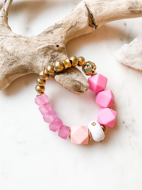 Gold and pink bracelet discount