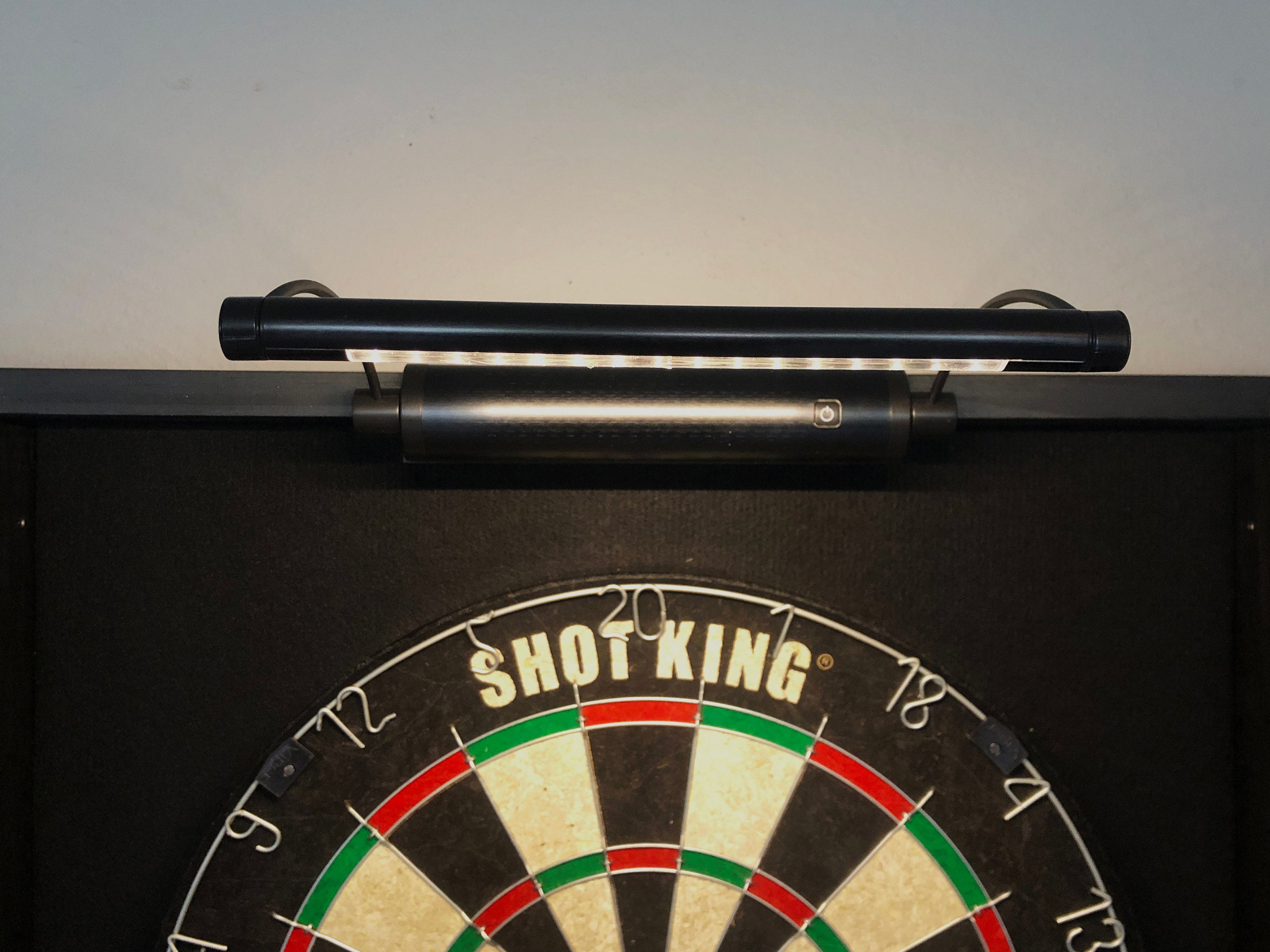 Makes a great fathers day gift  Our best selling Black dartboard cabinet with a Dartboard, darts, led light. and 2 scoreboards.