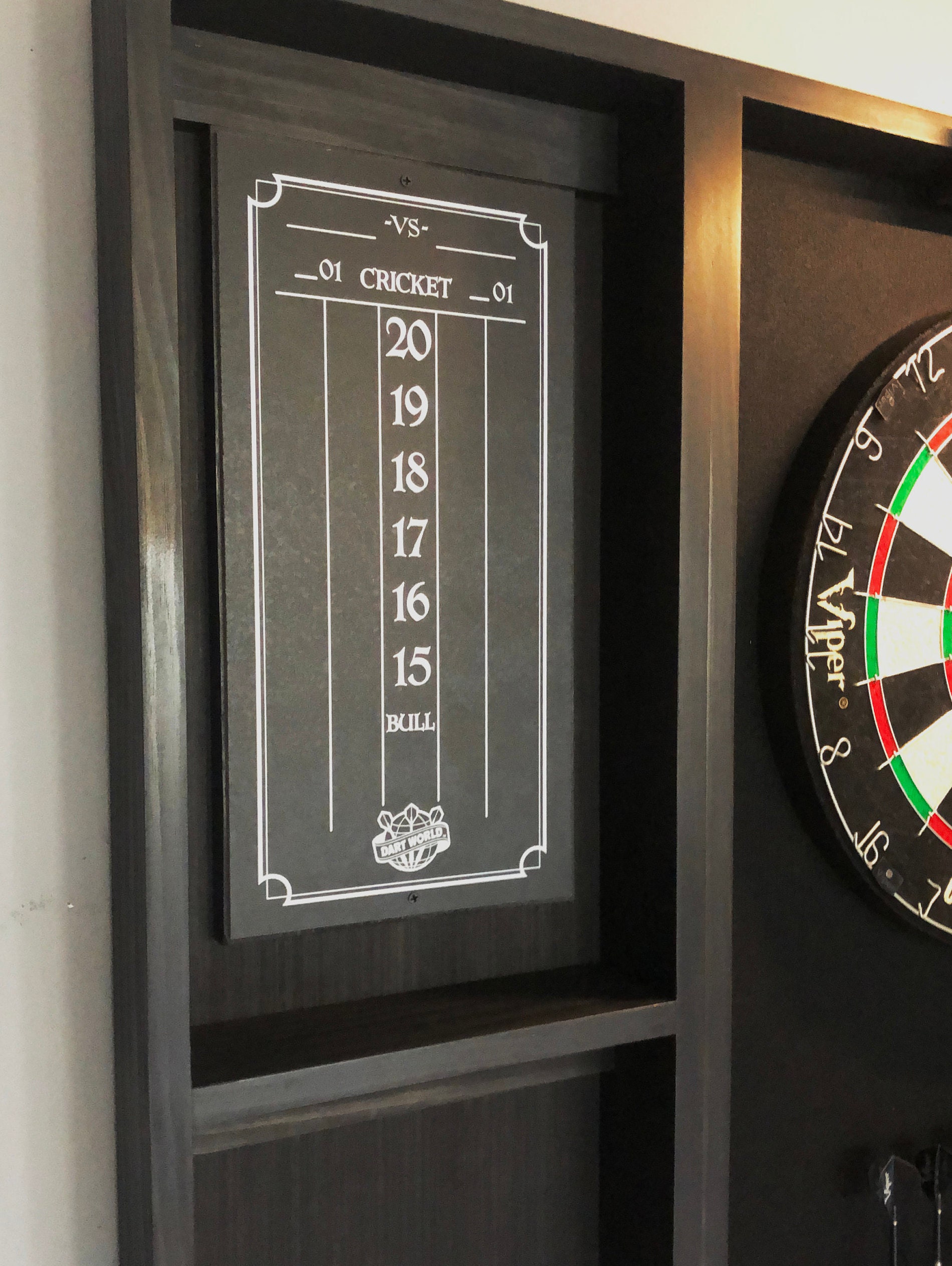 Makes a great fathers day gift  Our best selling Black dartboard cabinet with a Dartboard, darts, led light. and 2 scoreboards.
