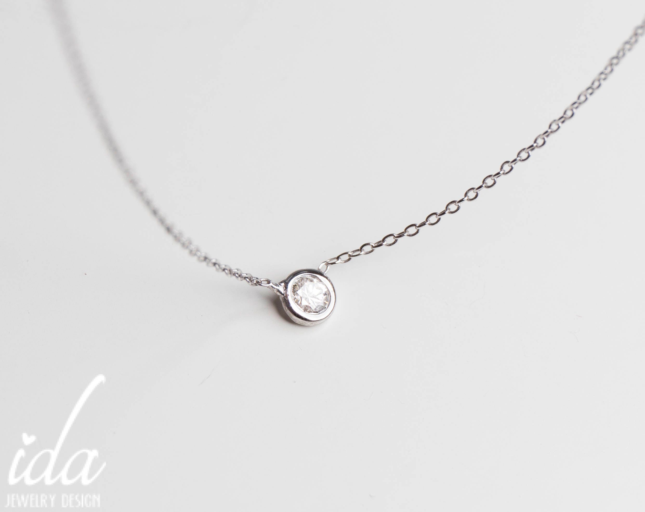 Floating diamond necklace store white gold