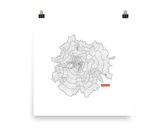 May include: A black and white topographic map of Mount Hood, Oregon, showing the mountain's elevation contours. The map is printed on a white background.