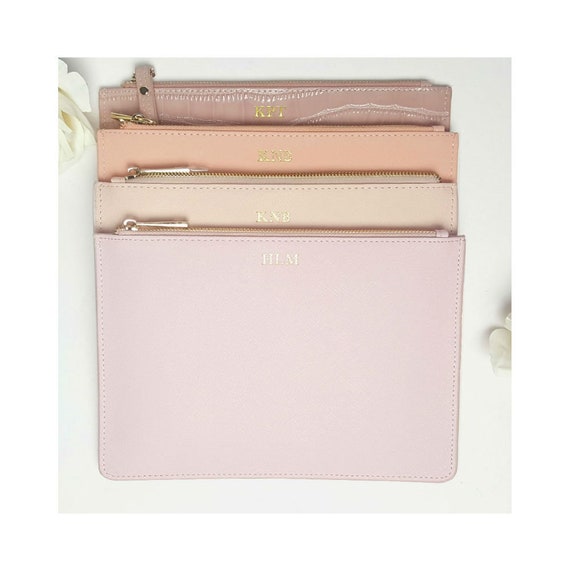 pastel pink clutch bag
