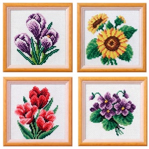 Cross Stitch Flower Kits. Beautiful floral themed cross stitch kits from Orchidea.Viola Iris Tulip Sunflower Pansy Narcissus Crocus Dog Rose