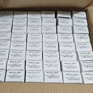 madeira mouline egyptian cotton hand embroidery threads viewed in original packaging boxes.