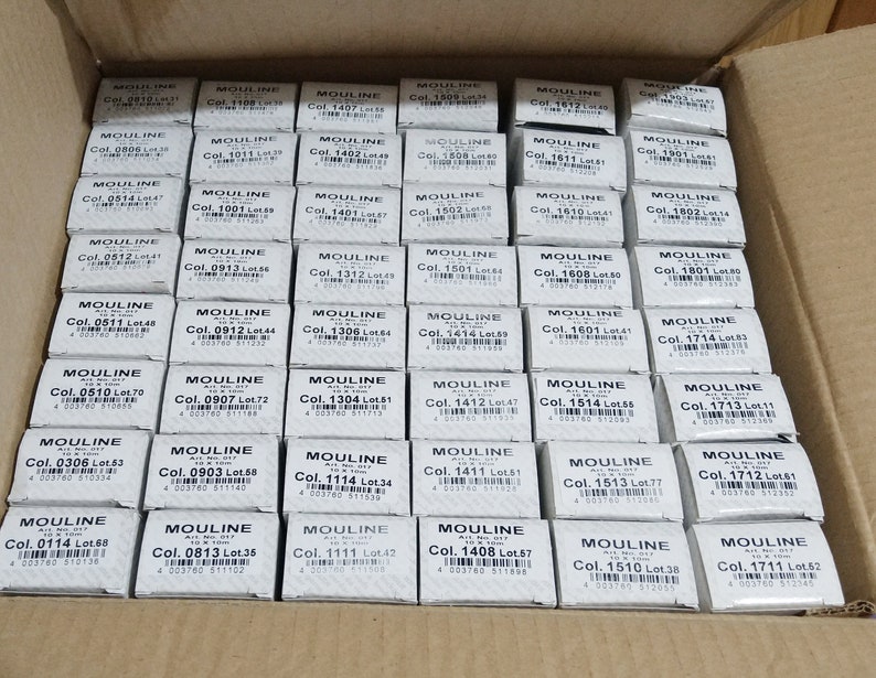 madeira mouline egyptian cotton hand embroidery threads viewed in original packaging boxes.