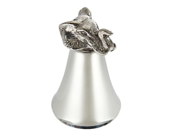 May include: Silver-toned metal shot glass with an elephant head design on the top.