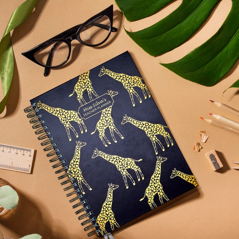 A4 personalised teacher planner, Giraffes on the front cover, wire bound available in a colour of your choice, double ribbon bookmarker in colour of your choice,