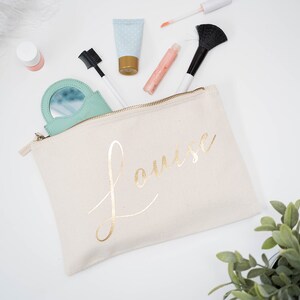 Cream cotton canvas make up with a sturdy zip and personalisation in gold foil.
