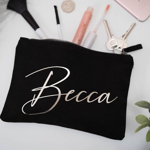 Black cosmetic cotton canvas make up bag with a sturdy zip and personalisation in silver foil.