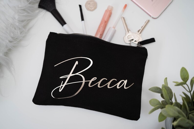 Black cosmetic cotton canvas make up bag with a sturdy zip and personalisation in silver foil.