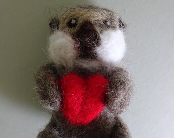 Felted sea otter - needle felted otter - otter collectable - otter with heart - otter with shell - otter miniature