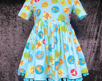 Girl’s Dr. Seuss dress with Pom poms