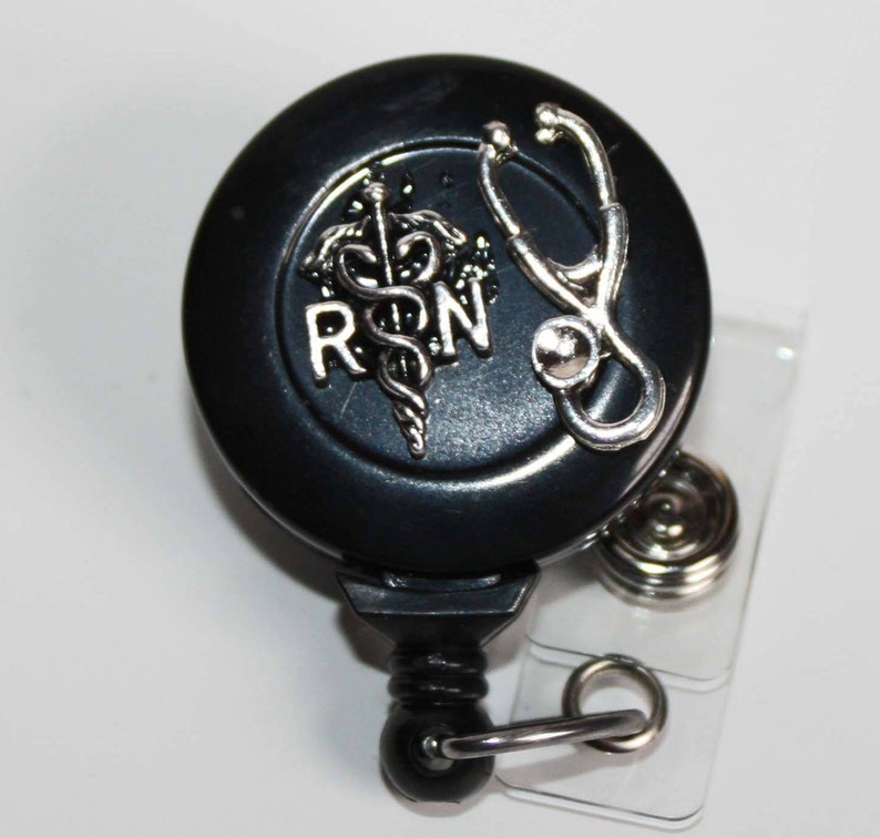 RN with Cadeuces and Stethoscope Badge Reel image 1