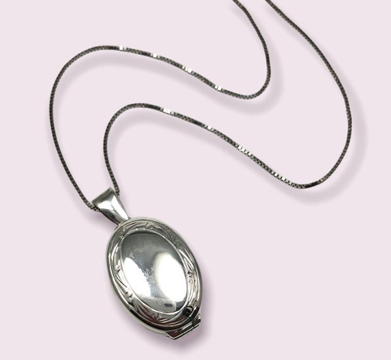 Vintage sterling silver locket for four pictures,… - image 1