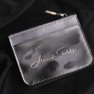 Cartera con cremallera para identificación