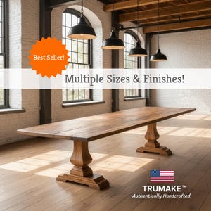 May include: A large, rectangular wooden dining table with a light brown finish. The table has two ornate pedestal bases and is displayed in a well-lit room. Text on the image reads "Multiple Sizes & Finishes!" and "Best Seller!"