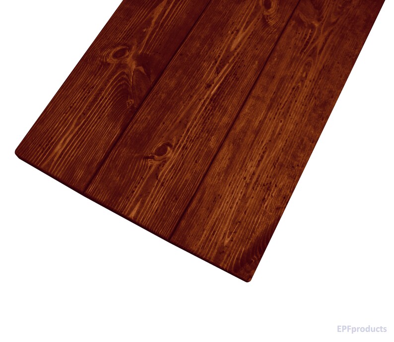 May include: A close-up of a dark brown wooden surface with a natural wood grain pattern. The wood has a smooth, polished finish.