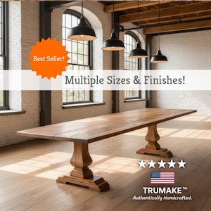 May include: A long rectangular wooden dining table with a smooth brown surface and two ornate pedestal bases. The image includes an orange starburst graphic with the text Best Seller! and the text Multiple Sizes & Finishes! along with five stars, a US flag, and the text TRUMAKE Authentically Handcrafted.