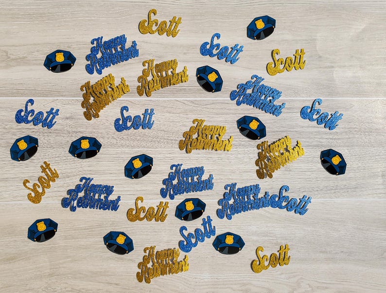May include: Blue and gold glitter confetti with the words "Happy Retirement" and "Scott" repeated throughout.  There are also blue glitter police officer badges.