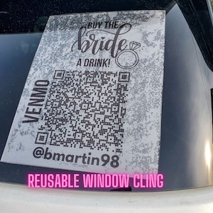 May include: Reusable window cling with a QR code and the text "Buy the bride a drink!" and "@bmartin98" printed on a white background.