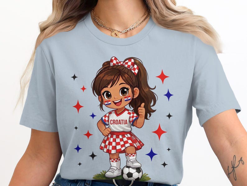 Cartoon girl in Croatia soccer uniform with checkerboard pattern, giving thumbs up.
