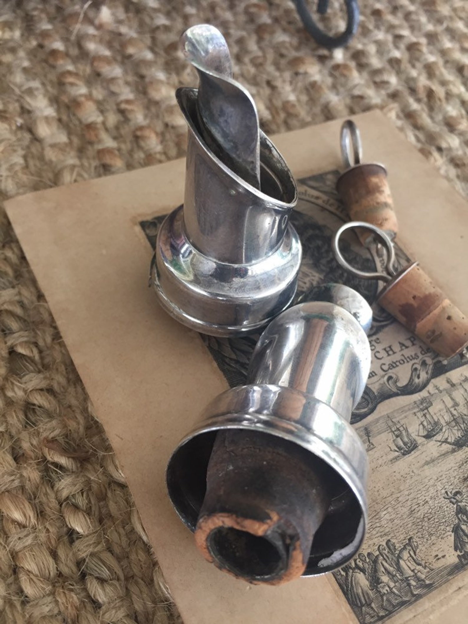 Two antique sliver wine bottle pourers with stoppers. Etsy
