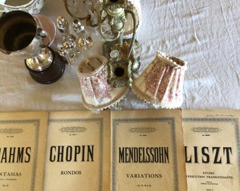 4 Antique music book sheets
