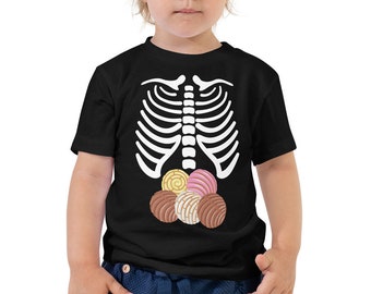 May include: A black t-shirt with a white skeleton design on the front. The skeleton has a group of colorful pastries in its ribcage.